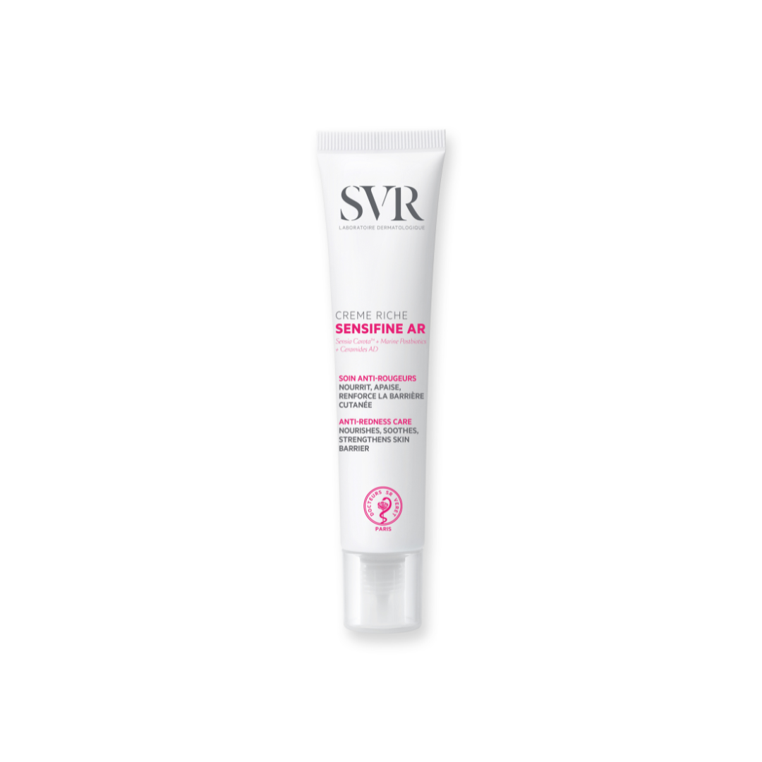 SVR Sensifine AR Crème Riche anti-redness face cream in a white squeeze tube with pink and black text.