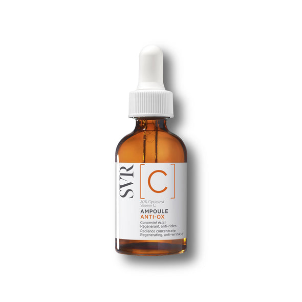 Flacon compte-gouttes en verre ambré SVR Ampoule Anti-Ox avec étiquette blanche et lettrage orange, 20% Vitamine C.