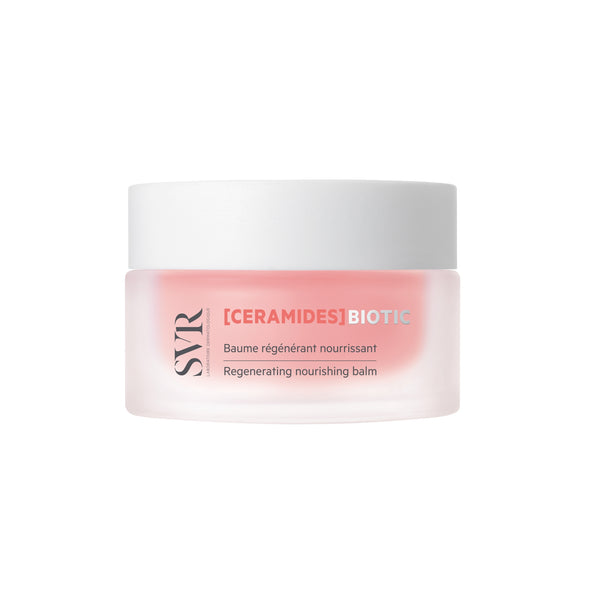 SVR [CERAMIDES] Biotic regenerating nourishing balm in a frosted glass jar with a white lid against a white background.