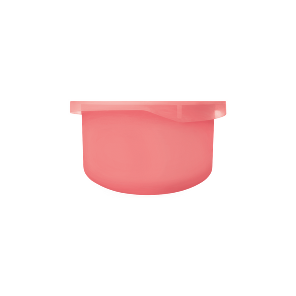 Small, round, coral-pink plastic cosmetic jar with a wide rim and smooth, minimalist design.